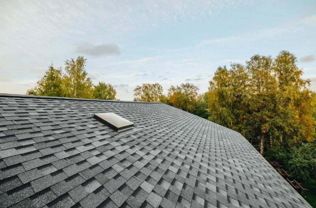 architectural shingle roofing system with skylights installed